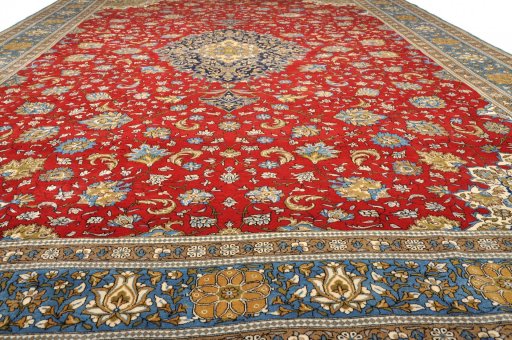 Full view of 1970s Ghom rug from Iran / Persia, 414 × 305 cm in Red tones