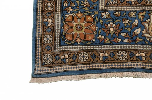 Close-up detail of 1970s Ghom rug from Iran / Persia showing Wool weave