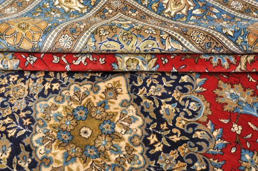 Close-up detail of 1970s Ghom rug from Iran / Persia showing Wool weave