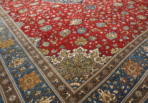 Close-up detail of 1970s Ghom rug from Iran / Persia showing Wool weave