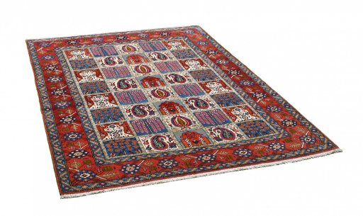 Corner detail of 1950s Ghom rug showing border pattern and Wool pile