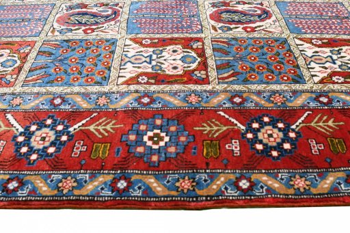 Central medallion detail of 1950s Ghom rug from Iran / Persia