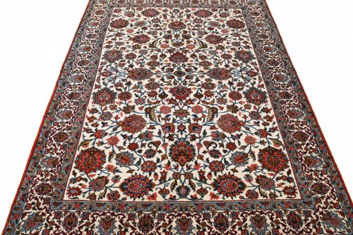 Surface texture of 1950s Ghom rug with natural Wool and intricate pattern