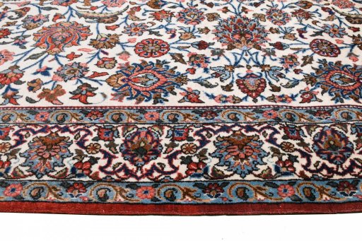 Central medallion detail of 1950s Ghom rug from Iran / Persia