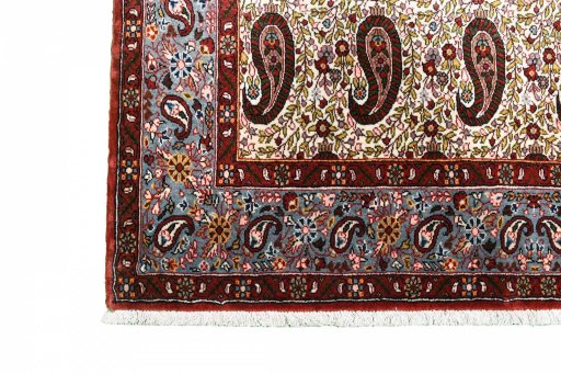 Backside of handmade 1950s Ghom rug showing knot structure and weave density