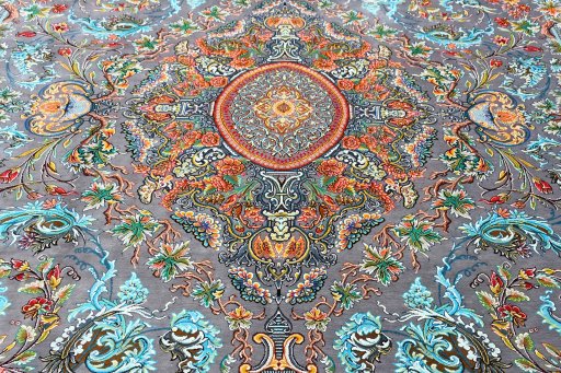 Surface texture of New Ghom rug with natural Silk and intricate pattern