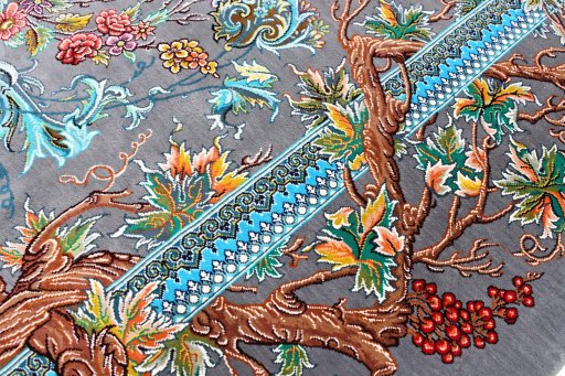 Corner detail of New Ghom rug showing border pattern and Silk pile