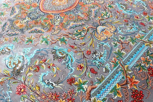 Close-up detail of New Ghom rug from Iran / Persia showing Silk weave