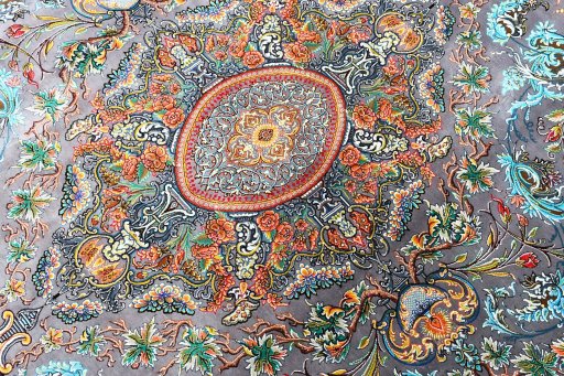 Surface texture of New Ghom rug with natural Silk and intricate pattern