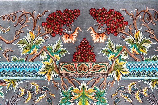Close-up detail of New Ghom rug from Iran / Persia showing Silk weave