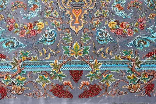 Backside of handmade New Ghom rug showing knot structure and weave density