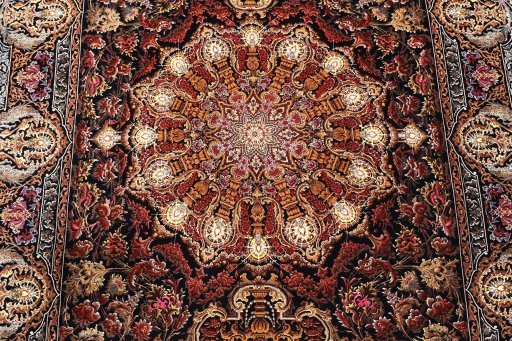 Corner detail of New Ghom rug showing border pattern and Silk pile