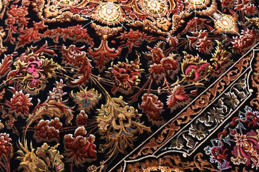 Close-up detail of New Ghom rug from Iran / Persia showing Silk weave