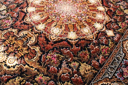 Backside of handmade New Ghom rug showing knot structure and weave density