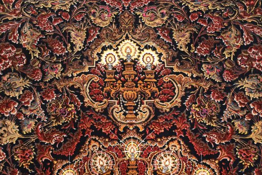 Corner detail of New Ghom rug showing border pattern and Silk pile