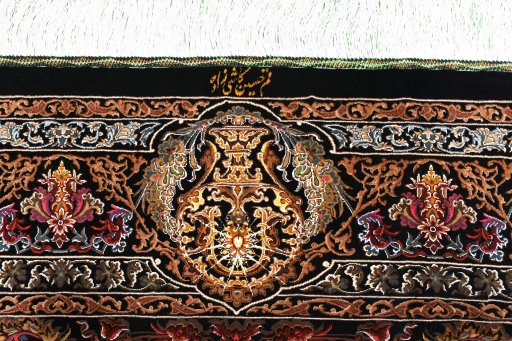 Surface texture of New Ghom rug with natural Silk and intricate pattern