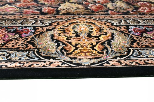 Backside of handmade New Ghom rug showing knot structure and weave density