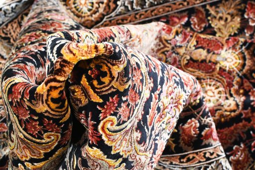 Close-up detail of New Ghom rug from Iran / Persia showing Silk weave