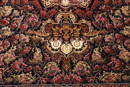Central medallion detail of New Ghom rug from Iran / Persia