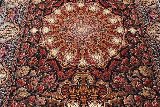 Close-up detail of New Ghom rug from Iran / Persia showing Silk weave