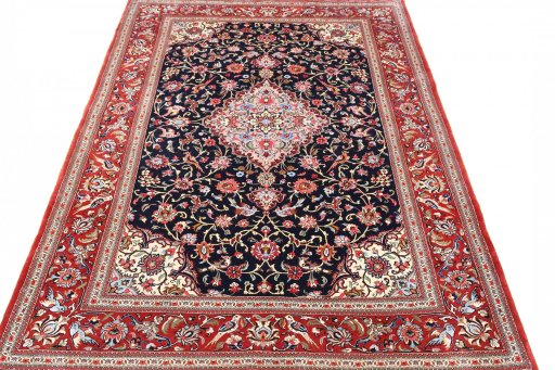 Surface texture of 2000s Ghom rug with natural Cork and intricate pattern