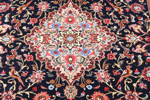 Central medallion detail of 2000s Ghom rug from Iran / Persia