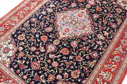 Close-up detail of 2000s Ghom rug from Iran / Persia showing Cork weave