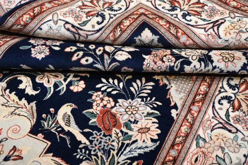 Surface texture of New Ghom rug with natural Wool and intricate pattern