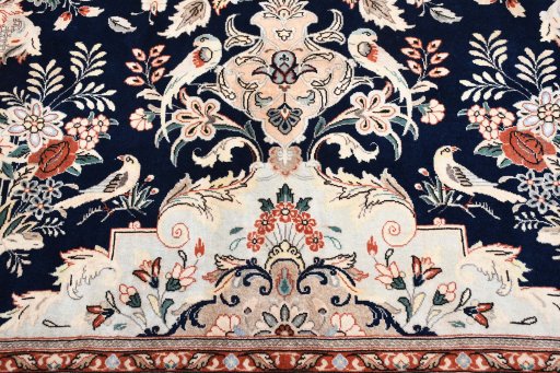 Backside of handmade New Ghom rug showing knot structure and weave density