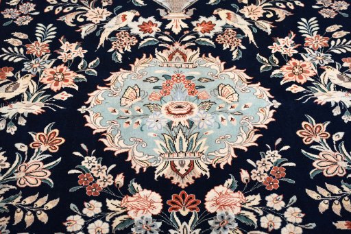 Central medallion detail of New Ghom rug from Iran / Persia