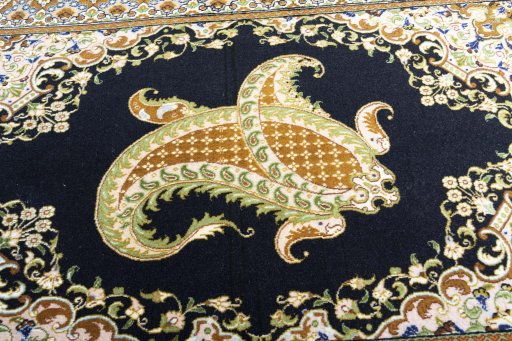 Central medallion detail of 2000s Ghom rug from Iran / Persia