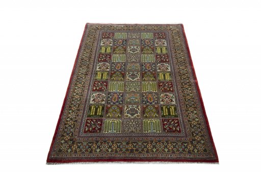 Surface texture of 2000s Ghom rug with natural Wool and intricate pattern