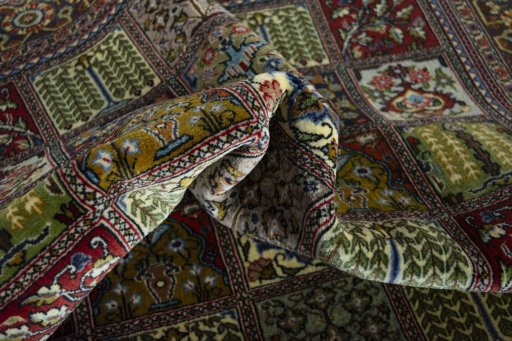 Full view of 2000s Ghom rug from Iran / Persia, 151 × 106 cm in Multi Color tones