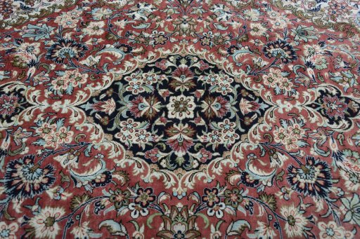 Central medallion detail of 1970s Ghom rug from Iran / Persia