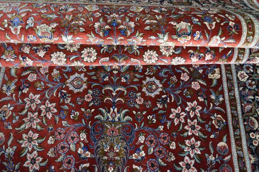 Close-up detail of 1970s Ghom rug from Iran / Persia showing Silk weave