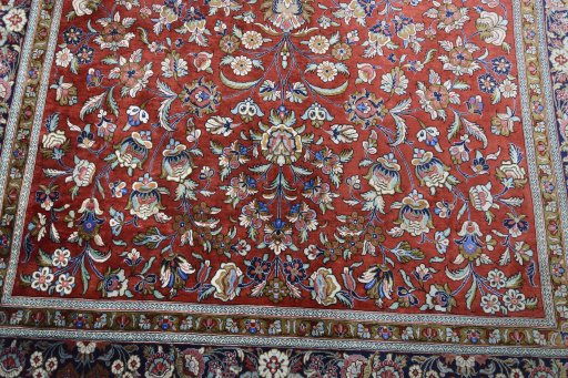 Central medallion detail of 1970s Ghom rug from Iran / Persia