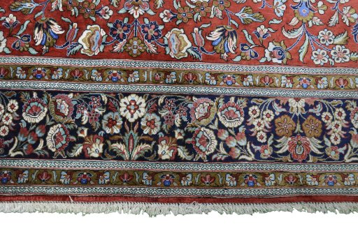 Full view of 1970s Ghom rug from Iran / Persia, 218 × 136 cm in Red tones