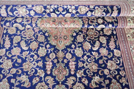 Close-up detail of 2000s Ghom rug from Iran / Persia showing Silk weave