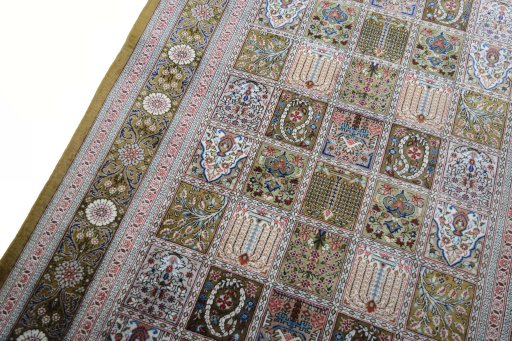 Backside of handmade New Ghom rug showing knot structure and weave density