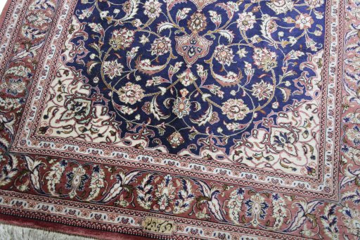 Close-up detail of 2000s Ghom rug from Iran / Persia showing Silk weave