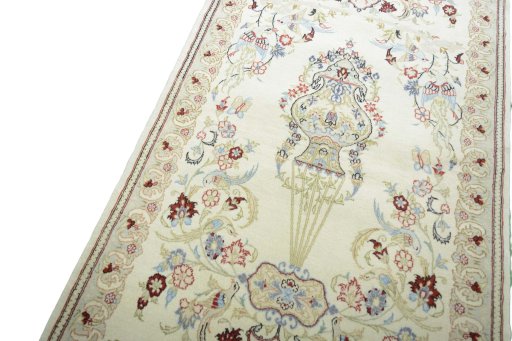 Backside of handmade New Ghom rug showing knot structure and weave density