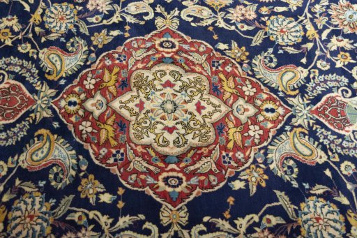 Central medallion detail of New Ghom rug from Iran / Persia