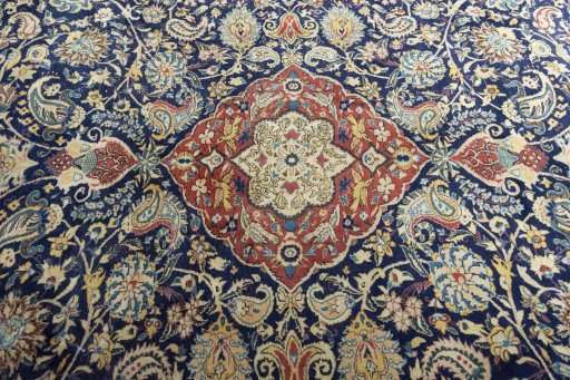 Central medallion detail of New Ghom rug from Iran / Persia