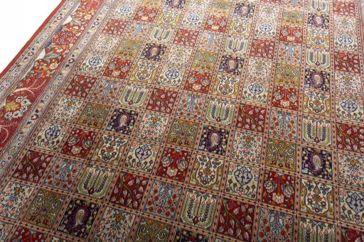 Backside of handmade New Ghom rug showing knot structure and weave density