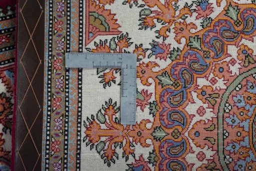 Surface texture of New Ghom rug with natural Cork and intricate pattern