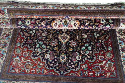 Close-up detail of 1970s Ghom rug from Iran / Persia showing Silk weave