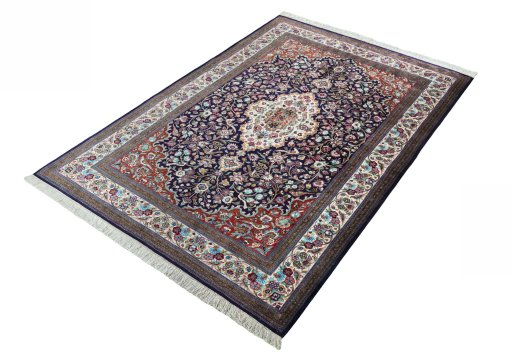 Corner detail of 1970s Ghom rug showing border pattern and Silk pile