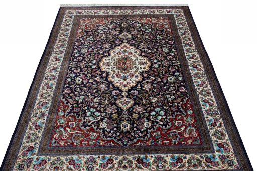 Surface texture of 1970s Ghom rug with natural Silk and intricate pattern
