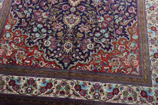 Close-up detail of 1970s Ghom rug from Iran / Persia showing Silk weave