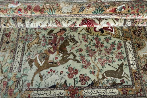 Close-up detail of 2000s Ghom rug from Iran / Persia showing Silk weave